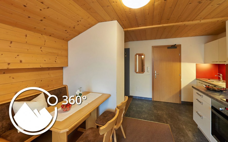 Wohnzimmer und Küche im Appartements 304